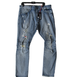 sipandshopboutique men's distressed vintage color patch jeans by Smoke Rise. Light Denim with Yellow, blue and red patches and blue stitching. trendy styles fashion for men pants