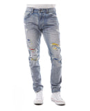 sipandshopboutique men's distressed vintage color patch jeans by Smoke Rise. Light Denim with Yellow, blue and red patches and blue stitching. trendy styles fashion for men pants